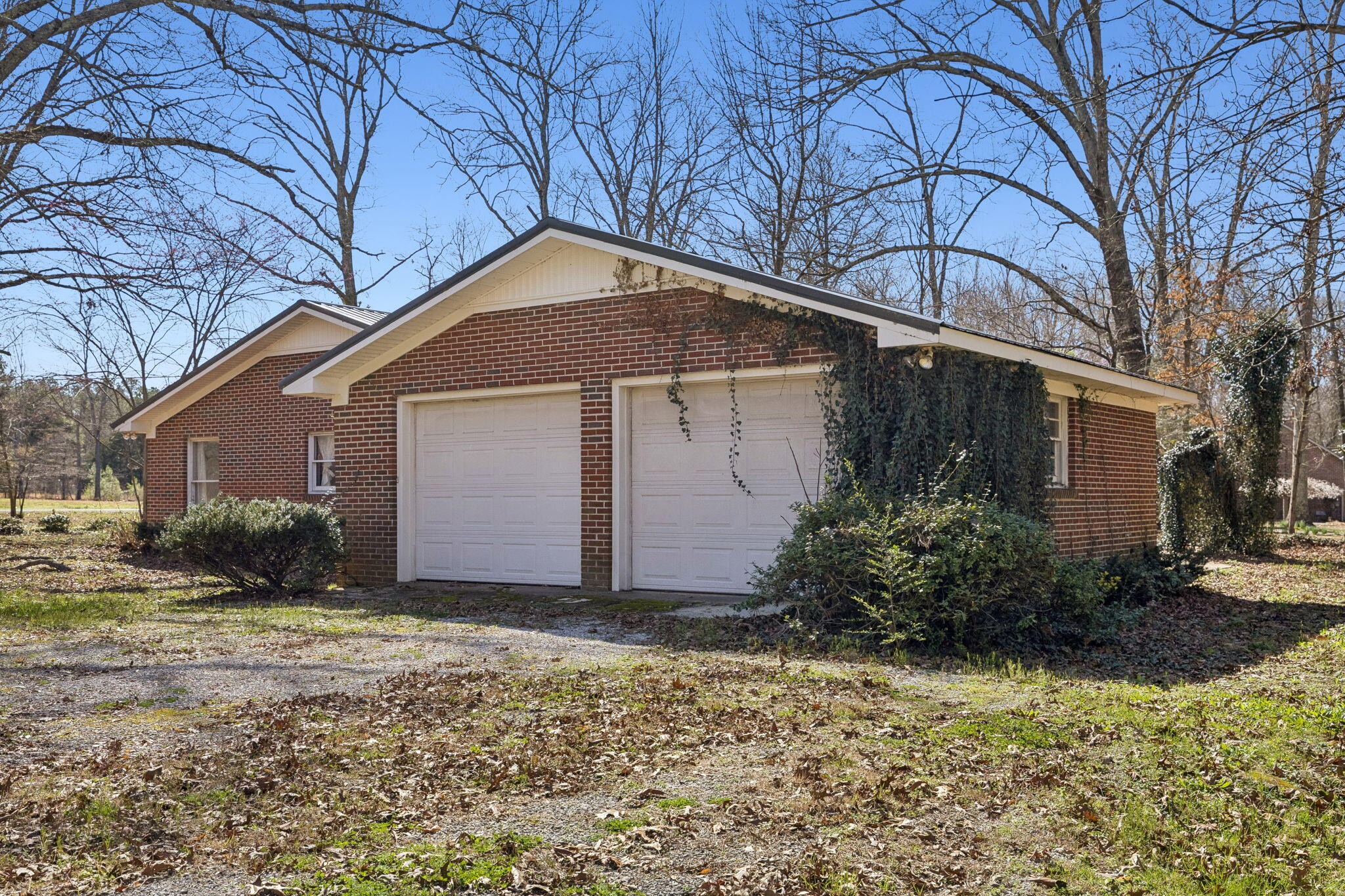 766 Bowling Alley Road Manchester, TN 37355 - Photo 44 of 57 a front view of house with yard and trees around