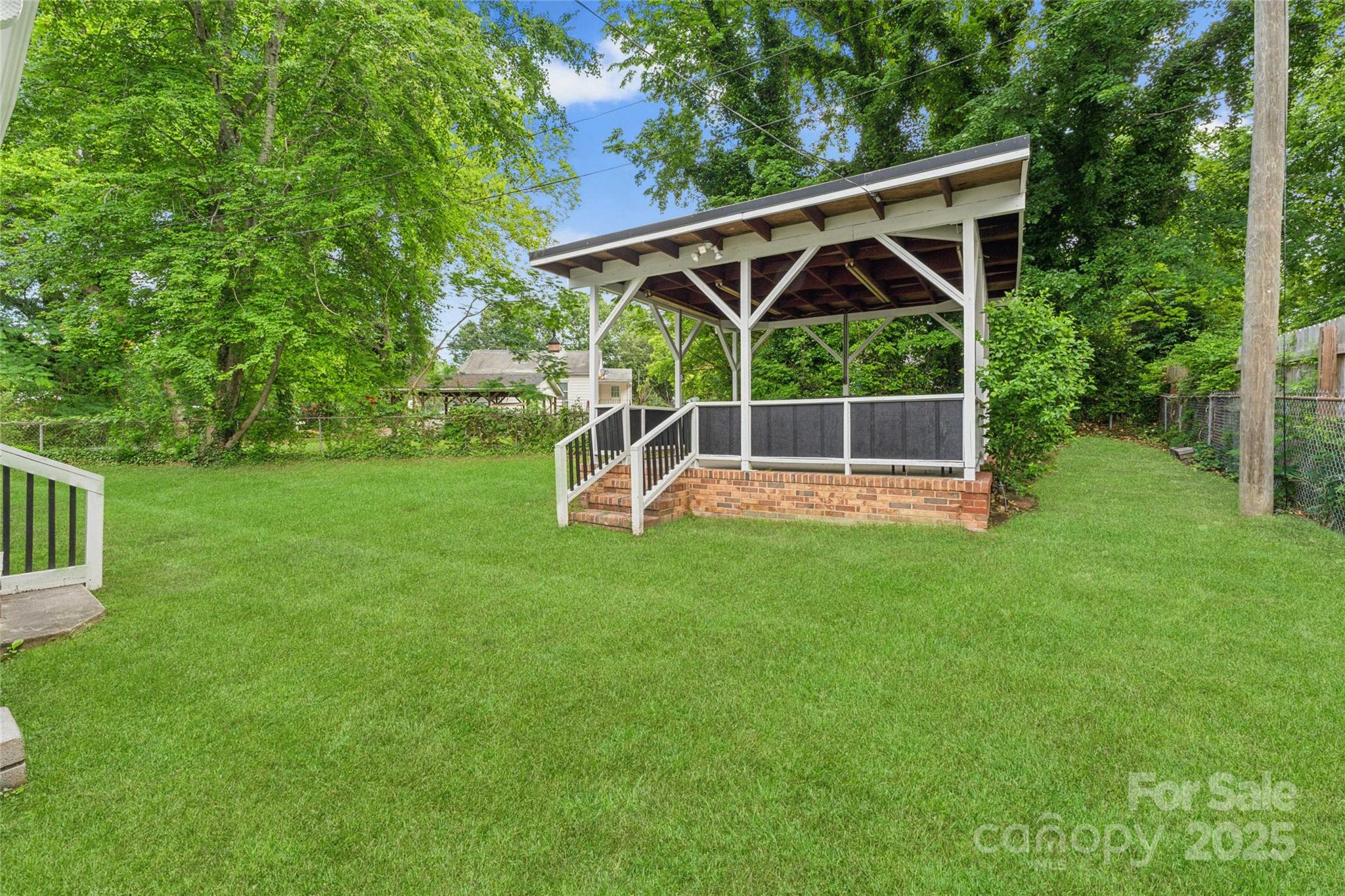 514 West 8th Avenue Gastonia, NC 28052 - Photo 19 of 19 a view of outdoor space with deck and backyard