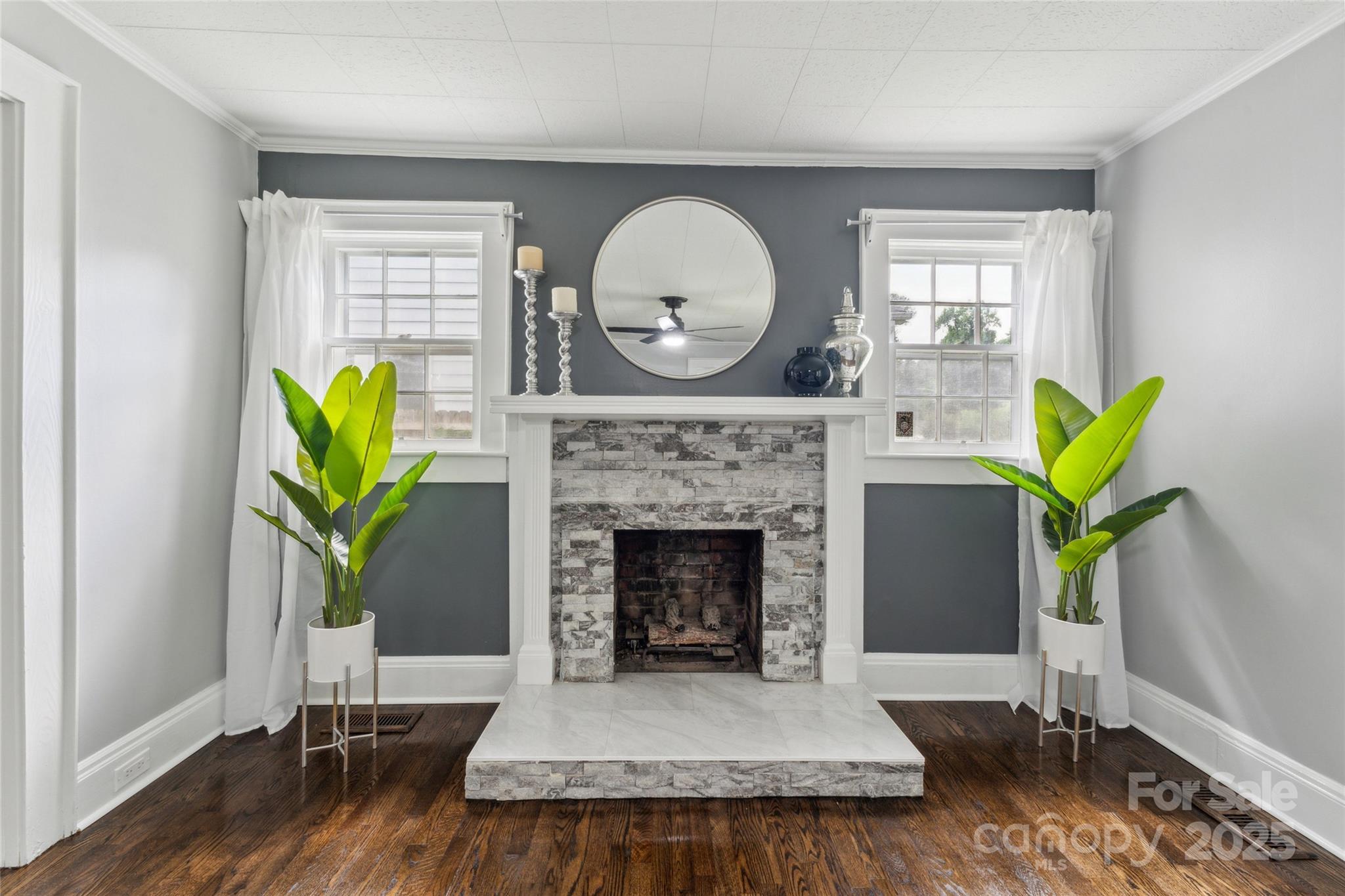 514 West 8th Avenue Gastonia, NC 28052 - Photo 6 of 19 a living room with furniture and a fireplace
