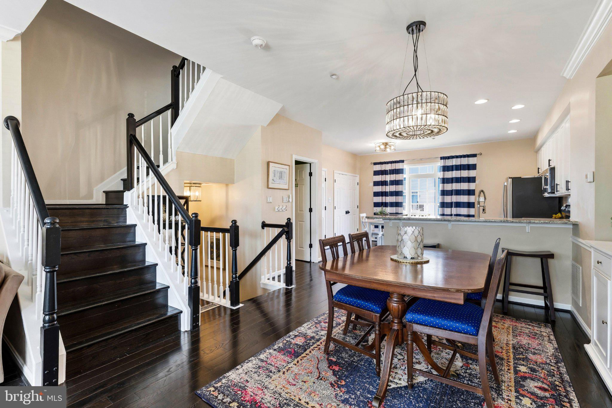 2668 Merlin Court Odenton, MD 21113 - Photo 3 of 42 a view of a dining room with furniture