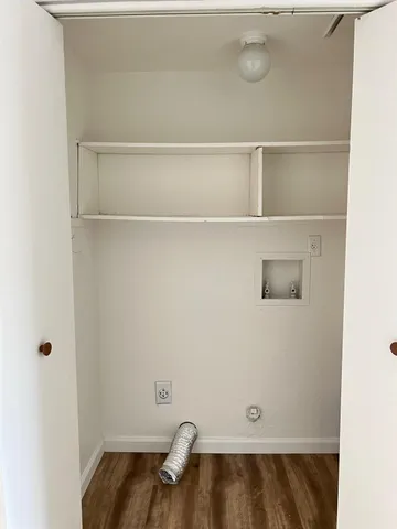 a view of small space with racks on the wall