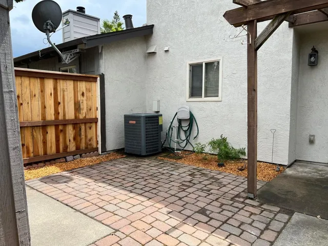 a front view of a house with backyard