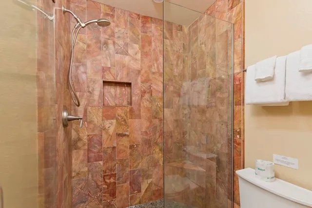 a bathroom with a shower curtain and a sink