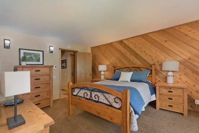 a bedroom with a bed and furniture