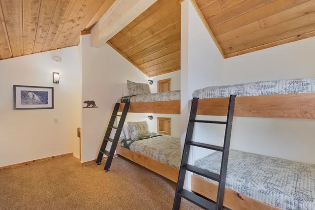 a view of an empty room with stairs