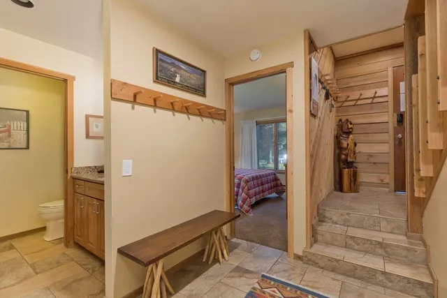 a view of a hallway with living room
