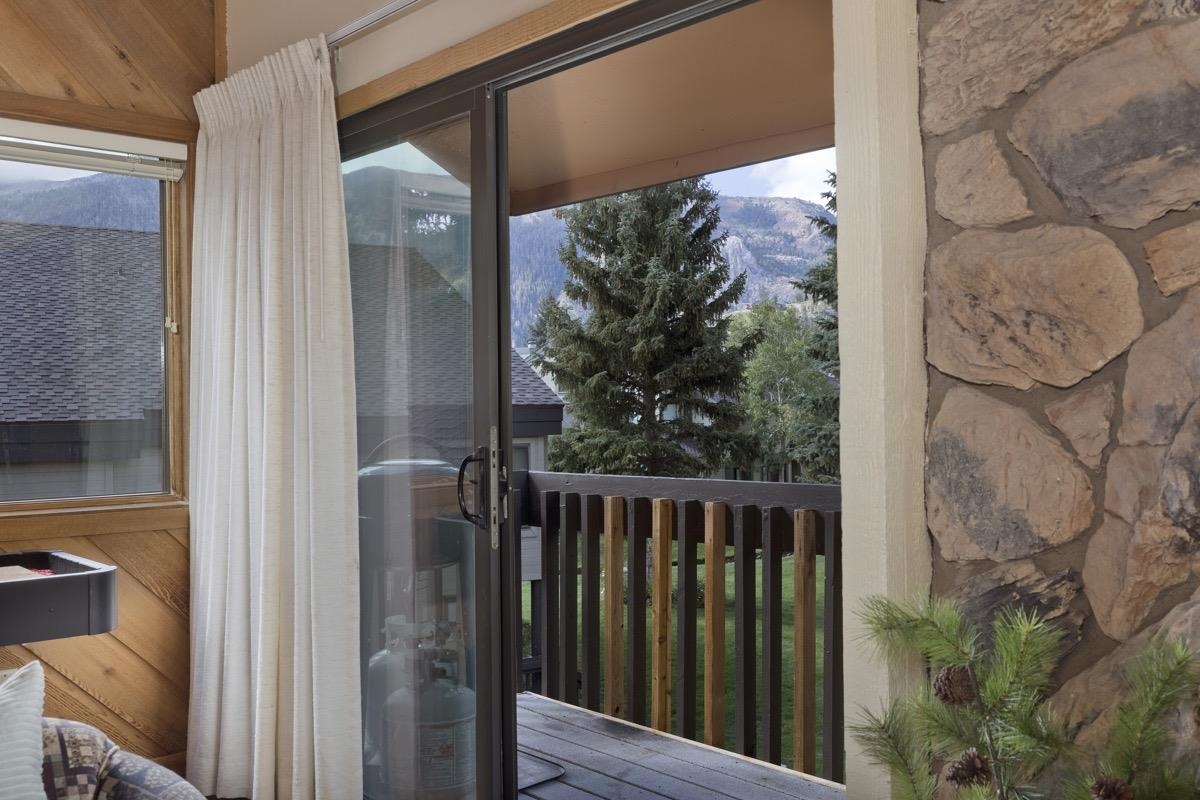 61 Goldhill, Unit 61 Mammoth Lakes, CA 93546 - Photo 41 of 44 a view of a balcony with wooden floor