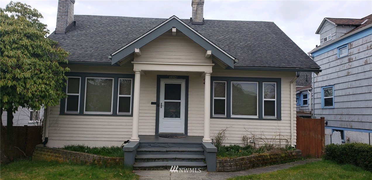 3308 Rockefeller Avenue Everett, WA 98201 - Photo 1 of 1 a front view of a house with a yard