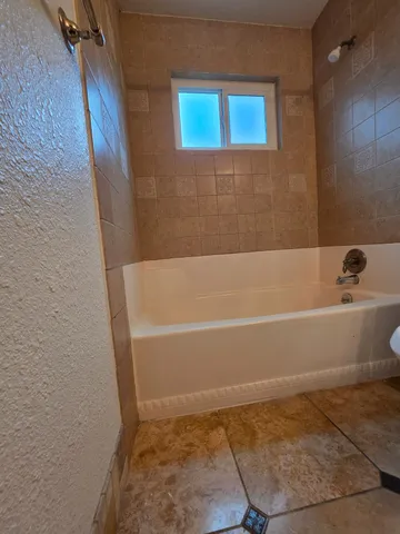 a bathroom with a bathtub