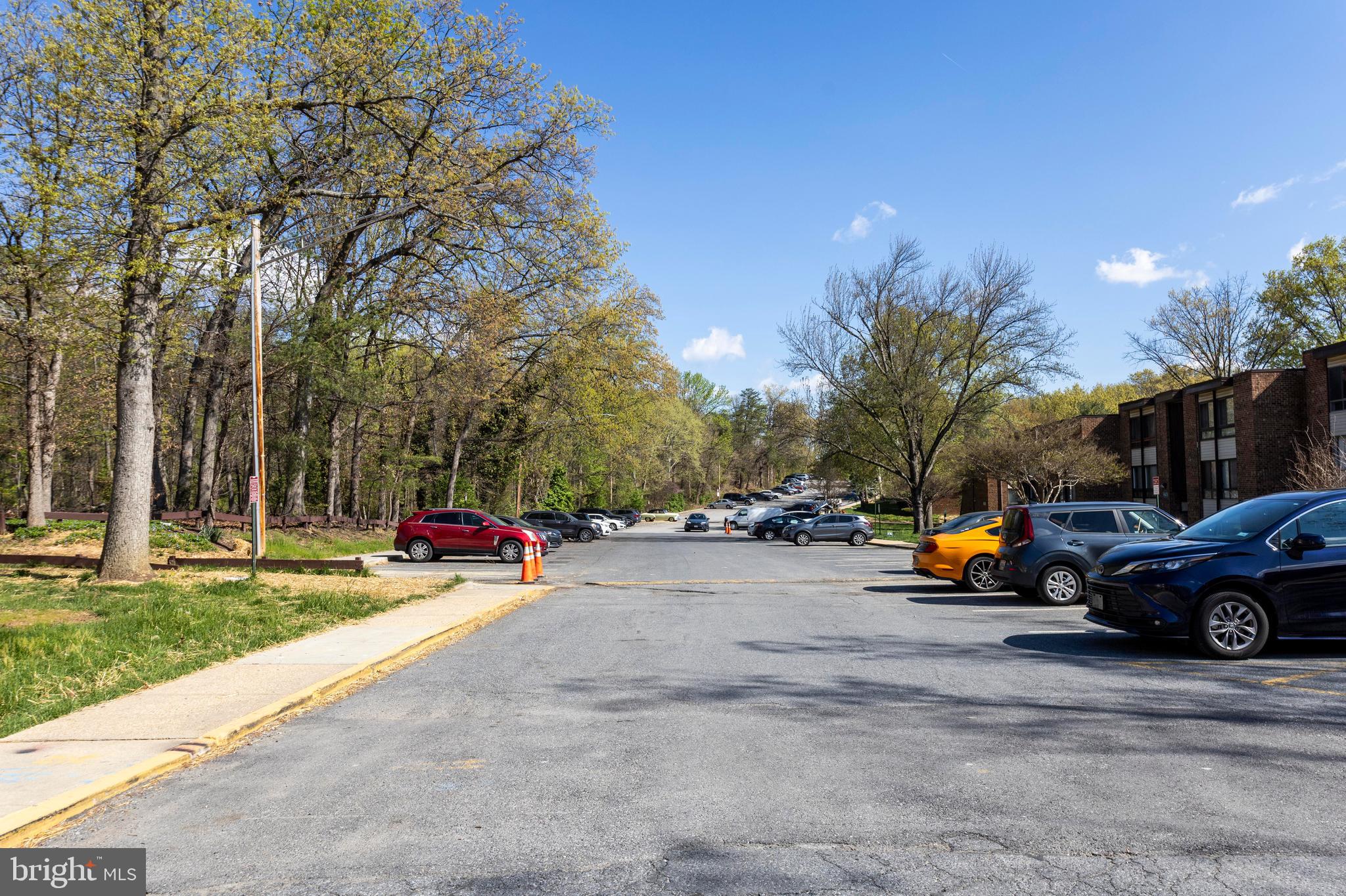 8467 Greenbelt Road, Unit 8467102 Greenbelt, MD 20770 - Photo 30 of 30 a view of street with parked cars