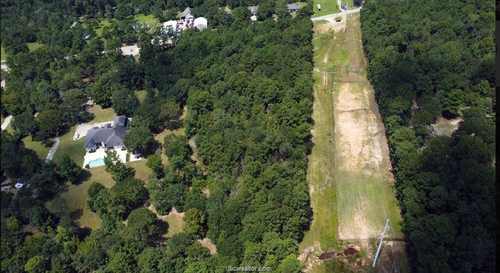 7800 Honea Egypt Road Montgomery, TX 77316 - Photo 2 of 8 a view of a yard with plants