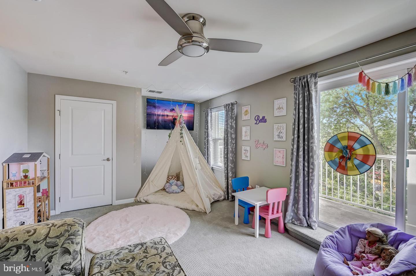 8102 Secluded Cove Lane Baltimore, MD 21222 - Photo 13 of 23 a bedroom with furniture and a window