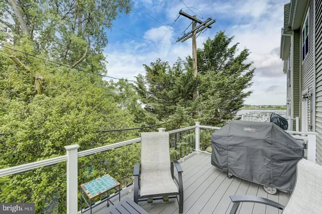 a view of balcony with furniture