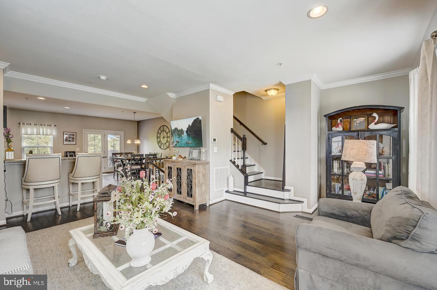 8102 Secluded Cove Lane Baltimore, MD 21222 - Photo 4 of 23 a living room with furniture and wooden floor