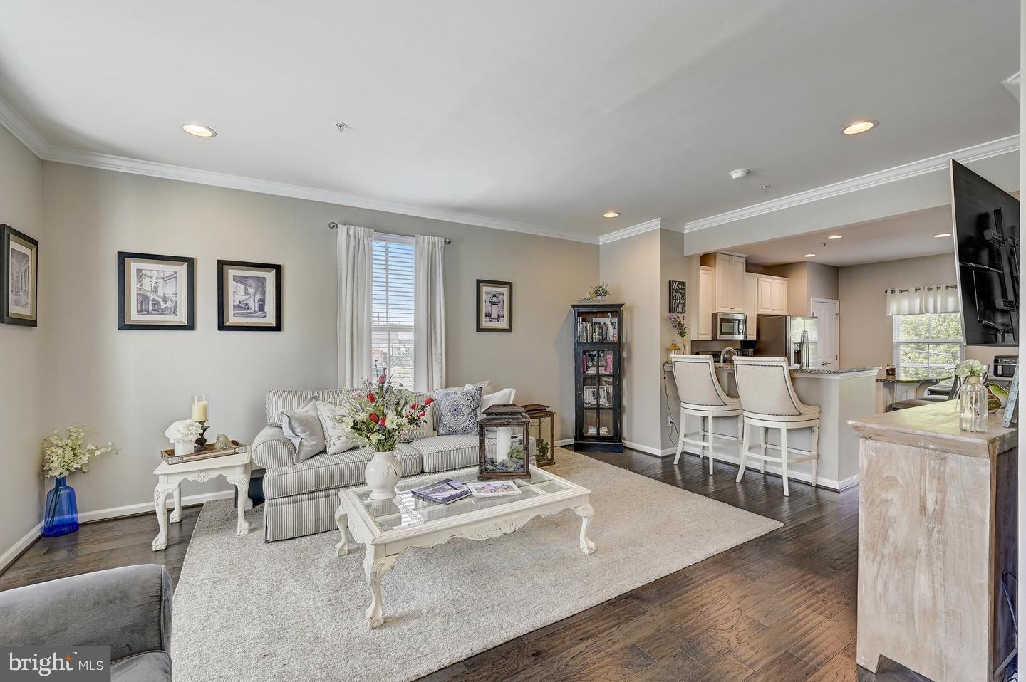 8102 Secluded Cove Lane Baltimore, MD 21222 - Photo 6 of 23 a living room with furniture and a table