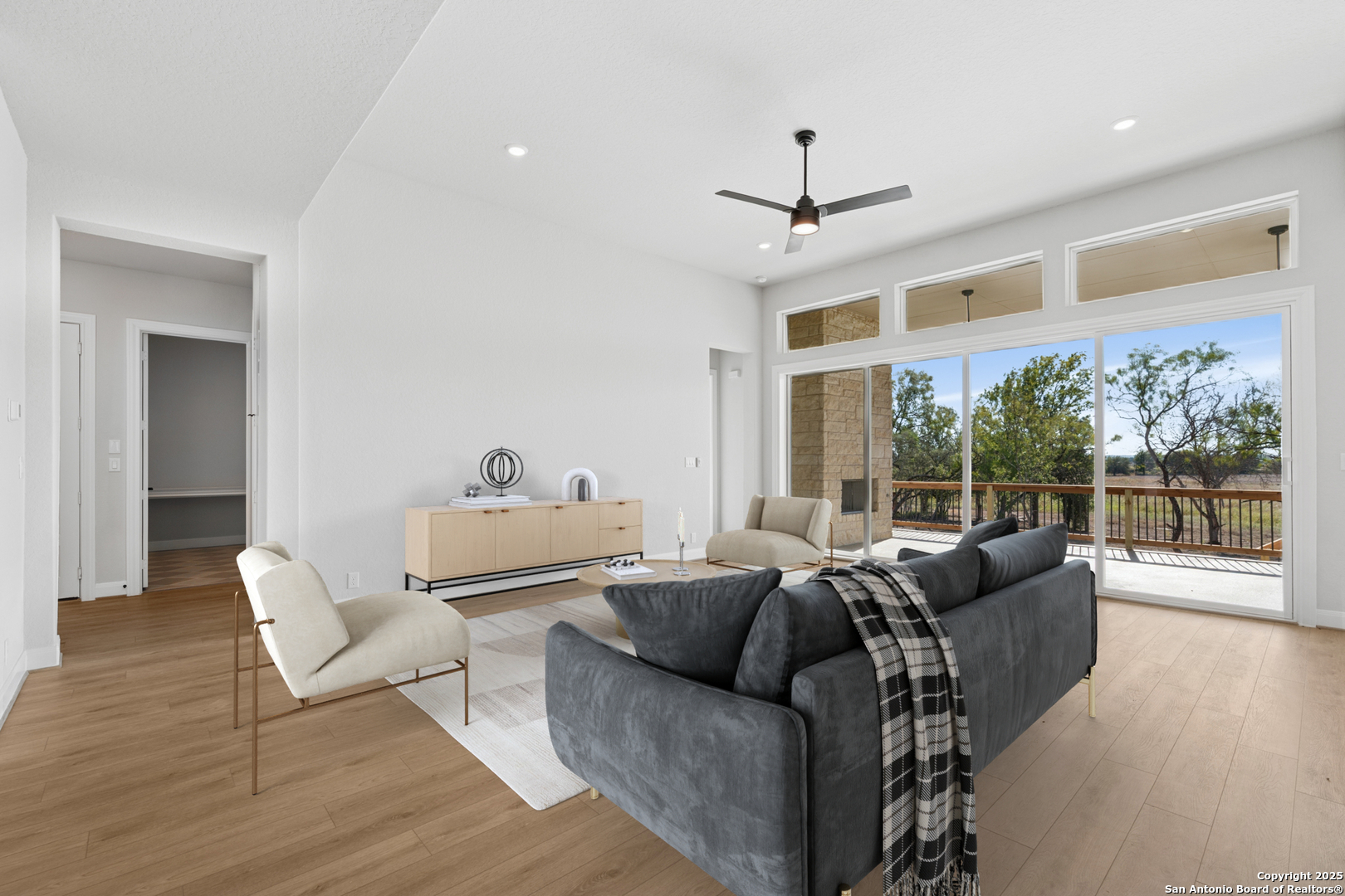 212 Brandon Cove Castroville, TX 78009 - Photo 3 of 36 a living room with furniture and a large window