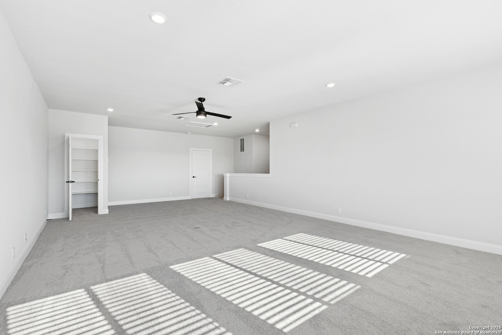 212 Brandon Cove Castroville, TX 78009 - Photo 36 of 36 an empty room with windows