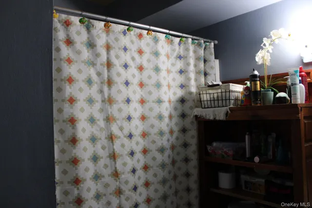 a kitchen with stainless steel appliances a sink a stove and a refrigerator