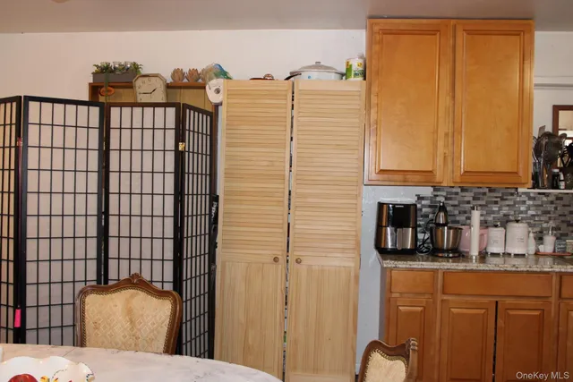 a kitchen with a stove and a sink