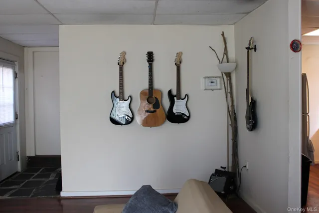 a kitchen with a sink a refrigerator and a stove