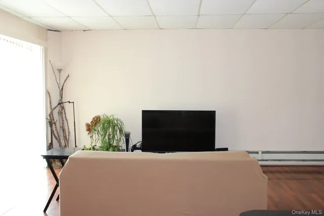 a bedroom with a bed and a table