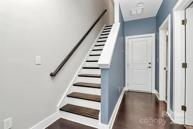 a view of entryway with wooden floor
