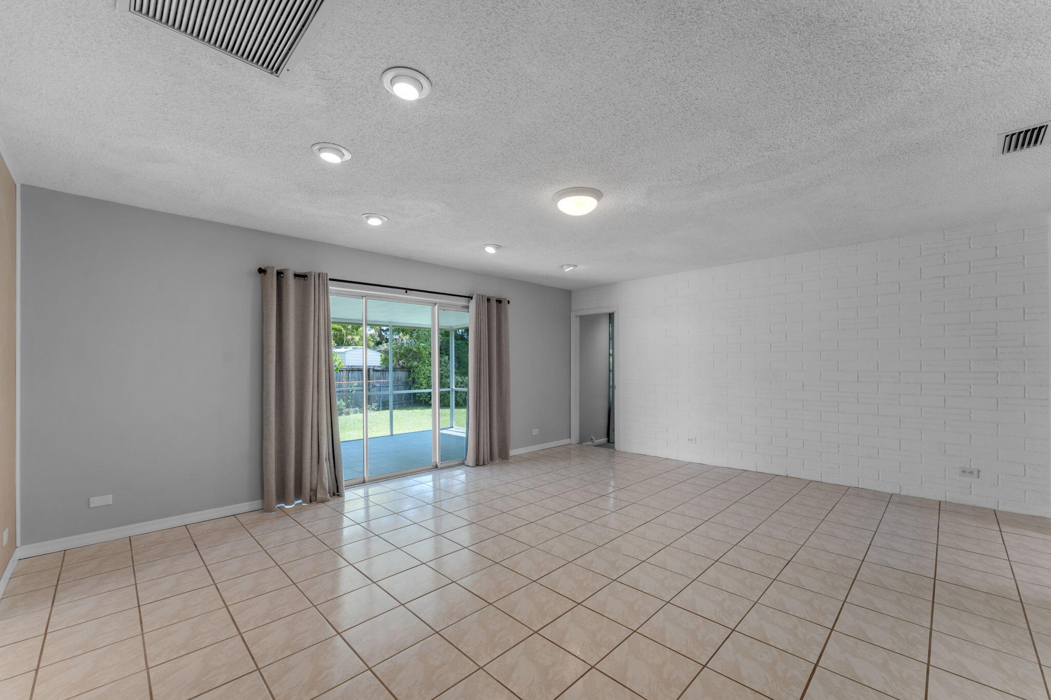 920 La Paloma Road Key Largo, FL 33037 - Photo 11 of 44 a view of an empty room and window