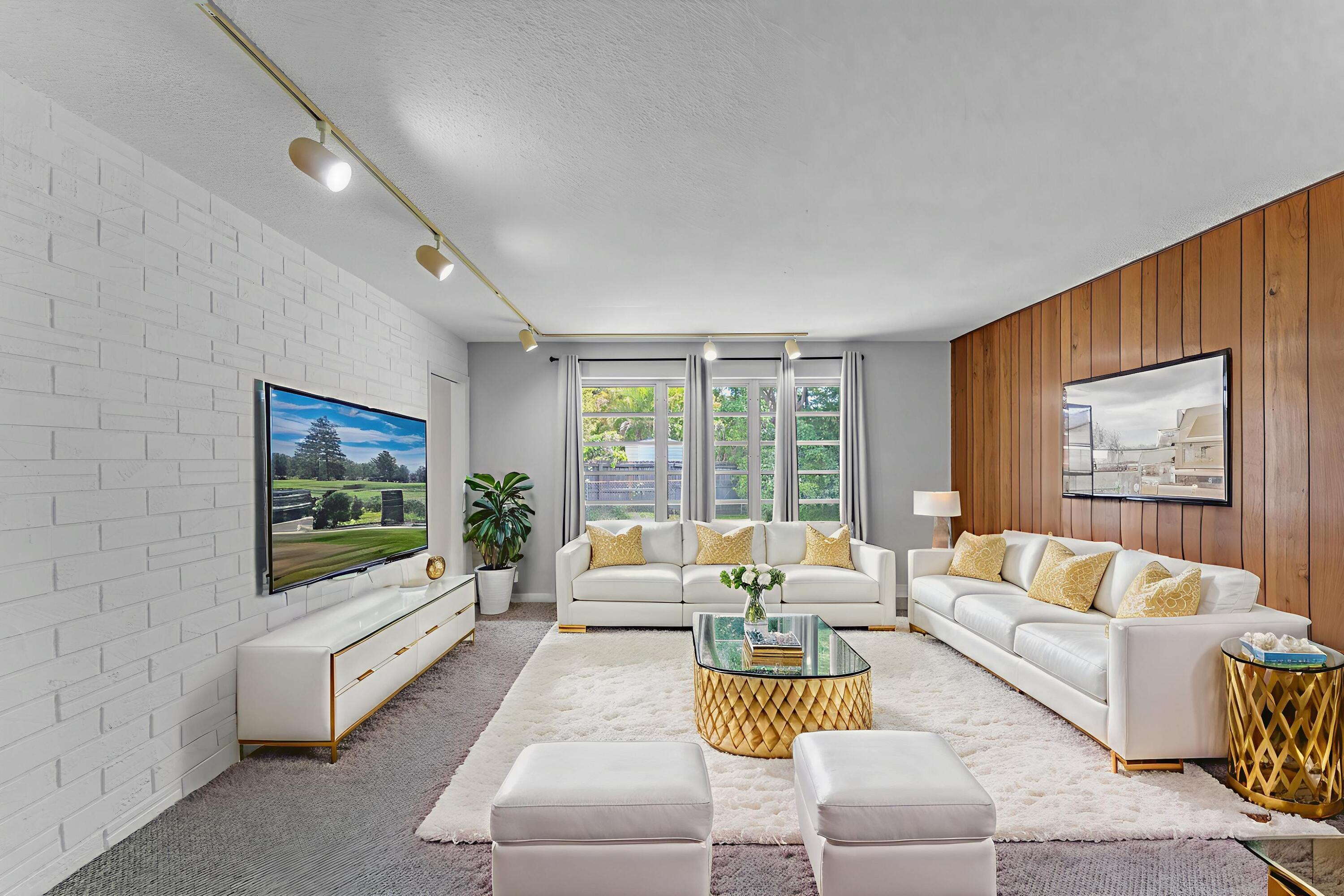 920 La Paloma Road Key Largo, FL 33037 - Photo 15 of 44 a living room with furniture and a flat screen tv