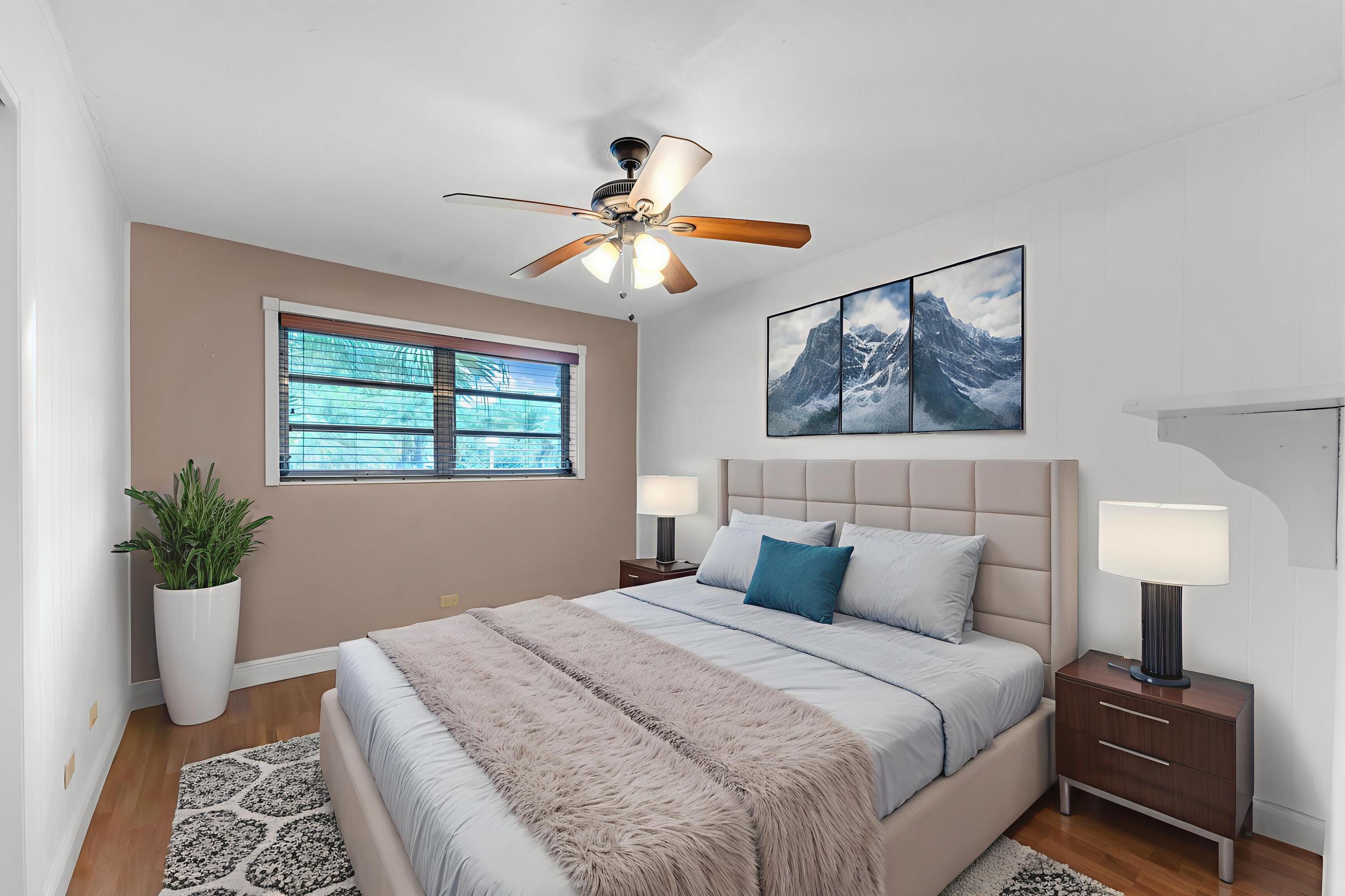 920 La Paloma Road Key Largo, FL 33037 - Photo 27 of 44 a bedroom with a bed and a window