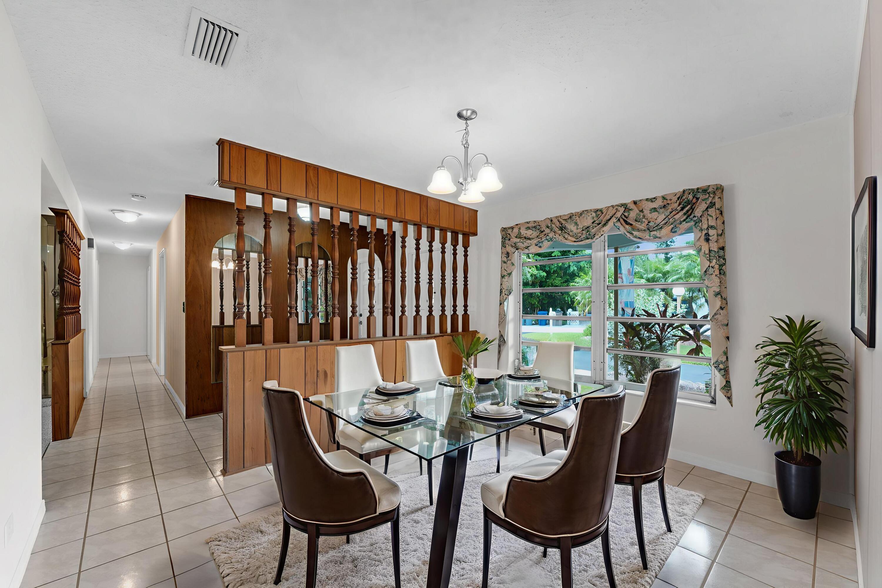 920 La Paloma Road Key Largo, FL 33037 - Photo 34 of 44 a view of a dining room with furniture window and outside view