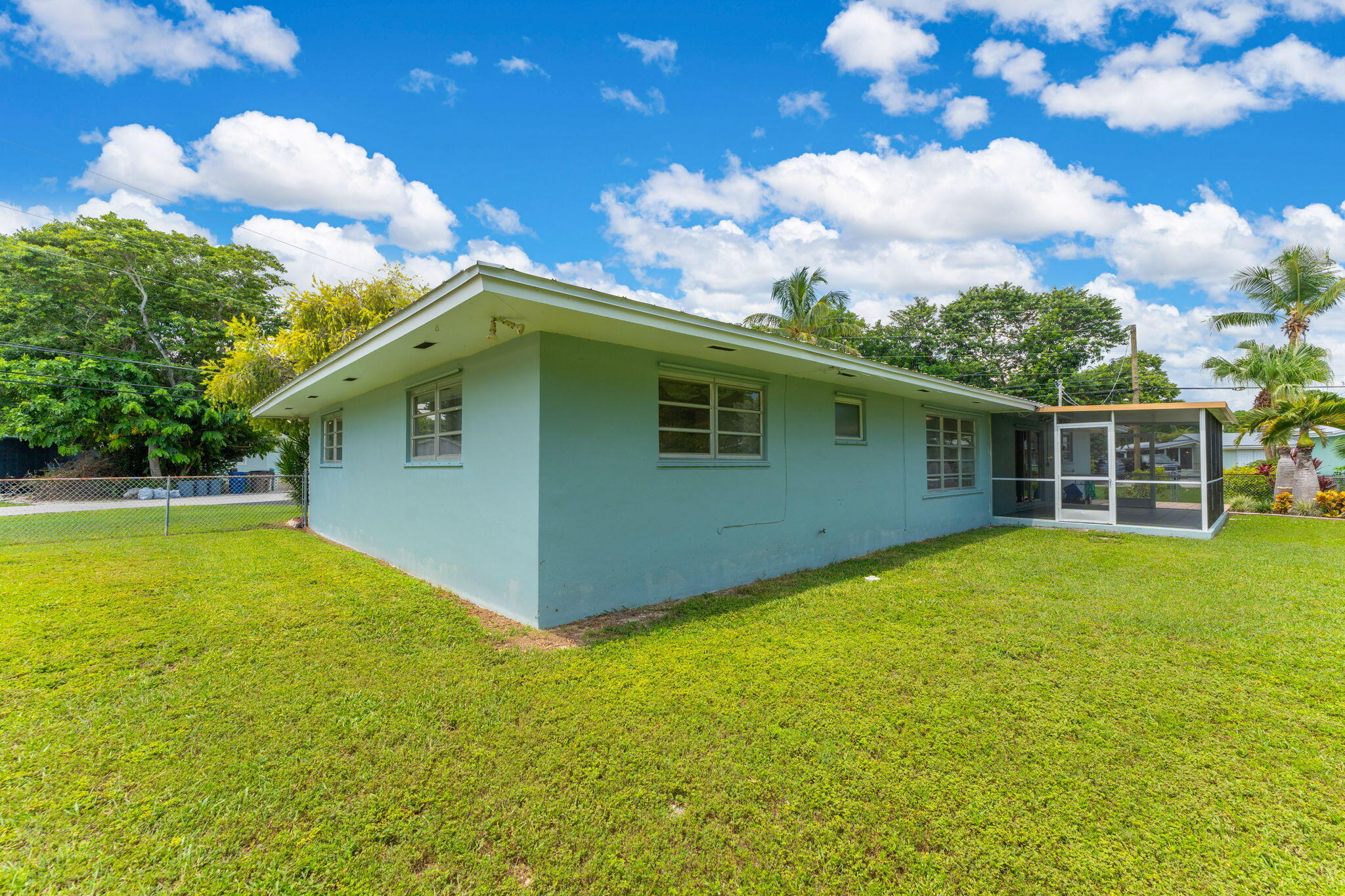 920 La Paloma Road Key Largo, FL 33037 - Photo 39 of 44 a view of a house with a backyard