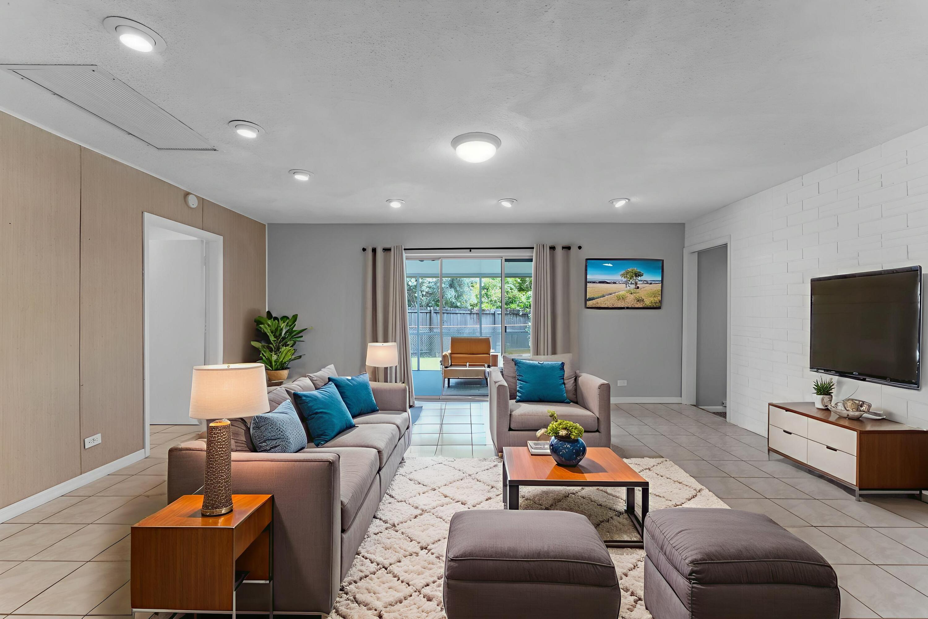 920 La Paloma Road Key Largo, FL 33037 - Photo 6 of 44 a living room with furniture and a flat screen tv