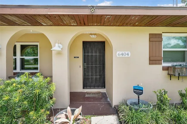 a front view of a house with outdoor space