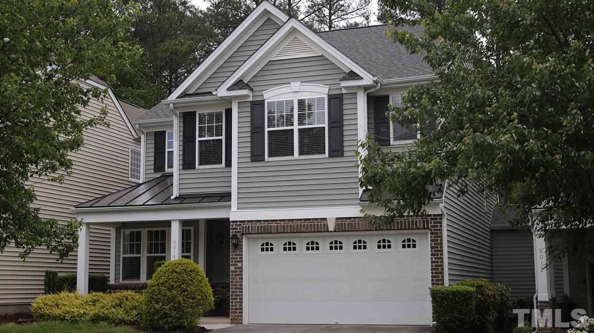 6014 McDevon Drive Raleigh, NC 27617 - Photo 3 of 28 Set among hardwood trees
