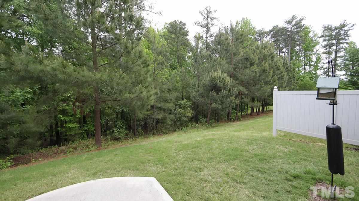 6014 McDevon Drive Raleigh, NC 27617 - Photo 26 of 28 Backs up to hardwood and Pine trees