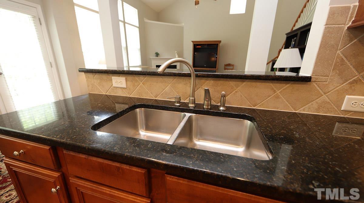 6014 McDevon Drive Raleigh, NC 27617 - Photo 9 of 28 Double Stainless sinks, ceramic backsplash