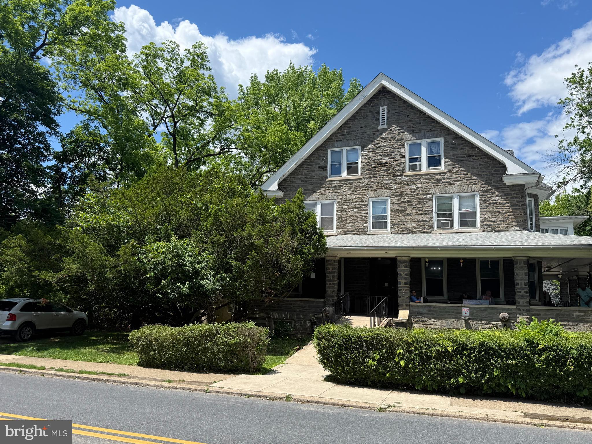 31 West Mill Road Flourtown, PA 19031 - Photo 7 of 12 a front view of a house with a yard