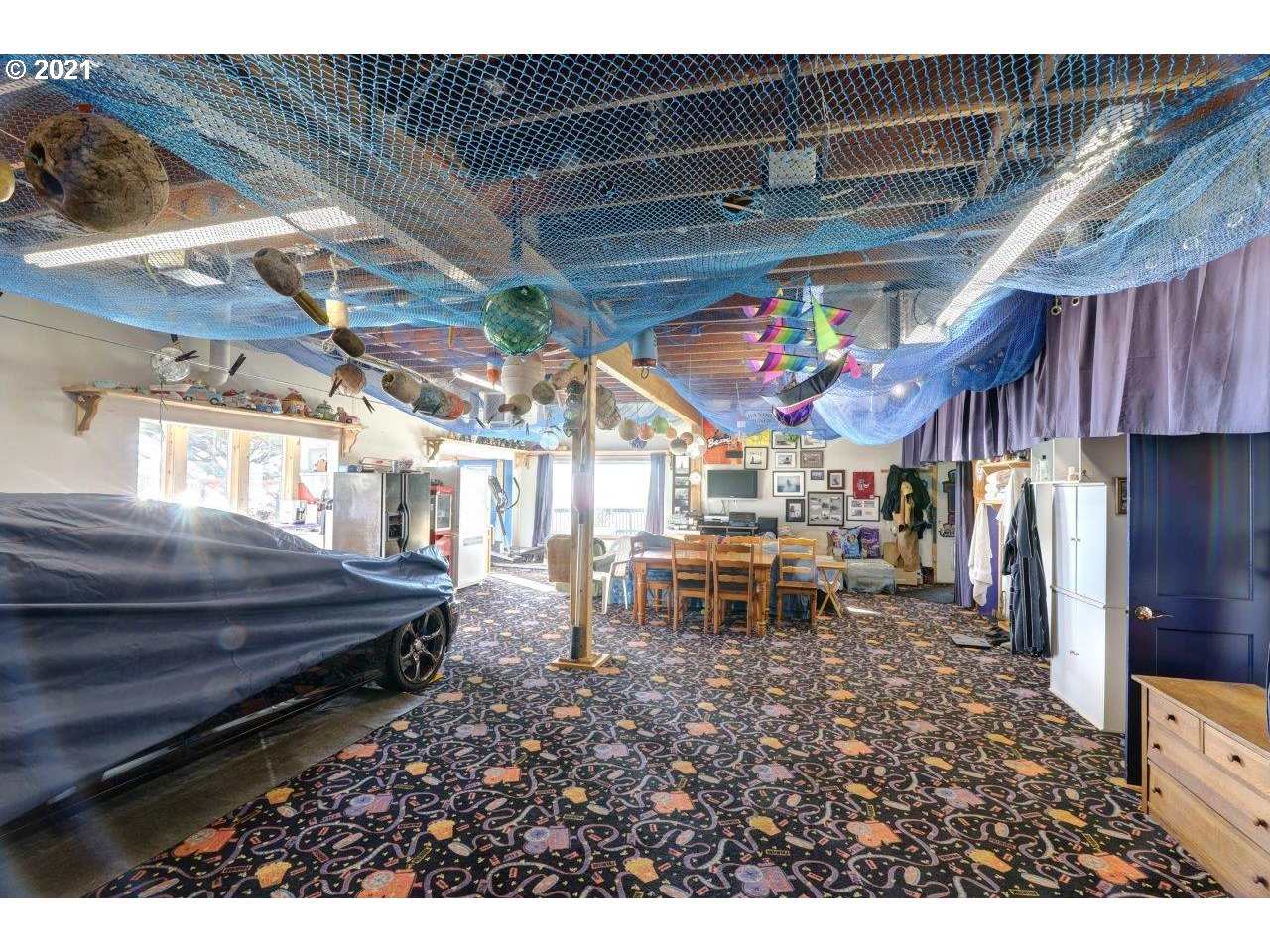 32307 Ruby Lane Cannon Beach, OR 97110 - Photo 17 of 27 a view of a chairs and tables in patio