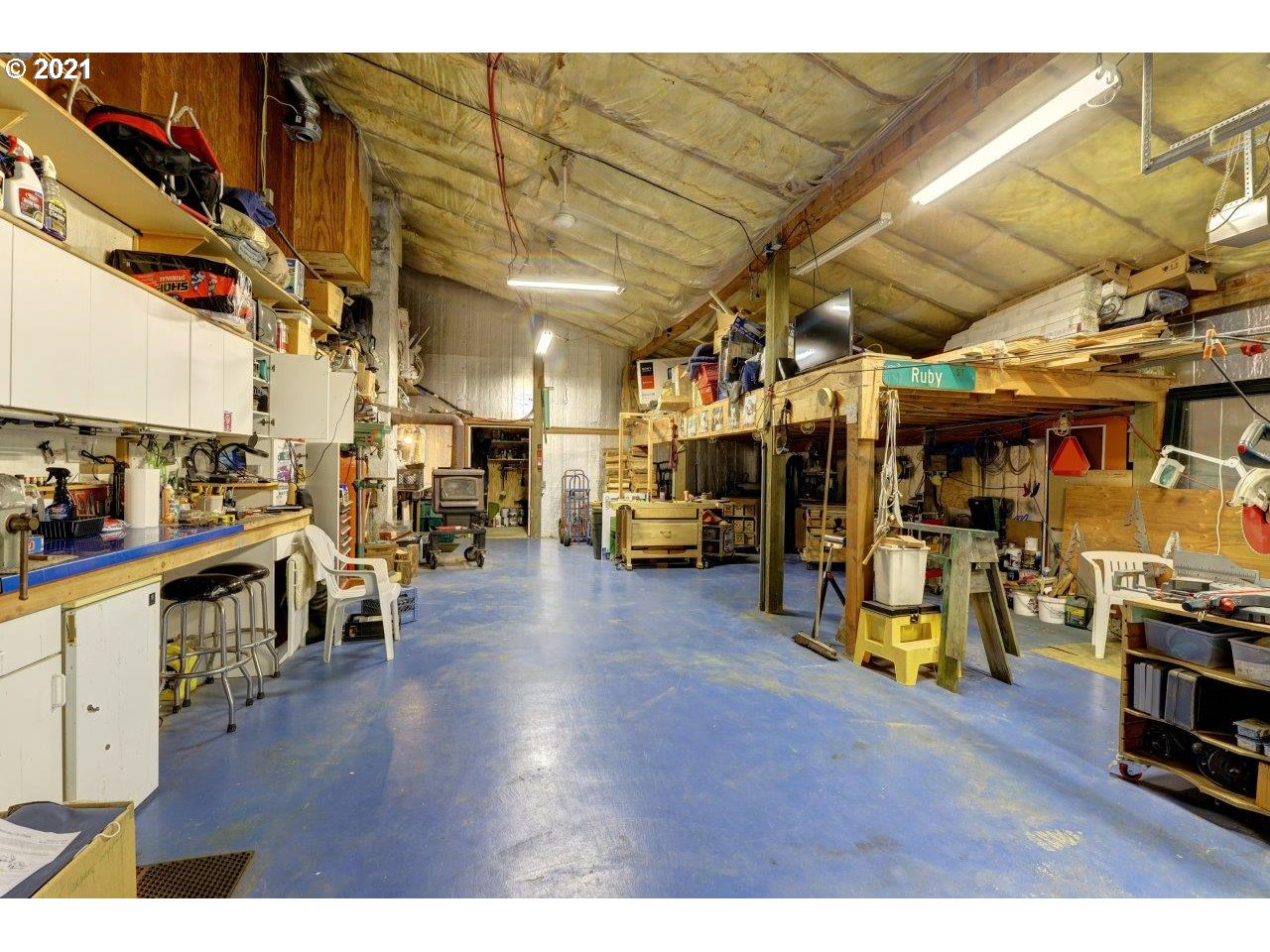32307 Ruby Lane Cannon Beach, OR 97110 - Photo 21 of 27 a view of a big room with wooden floor