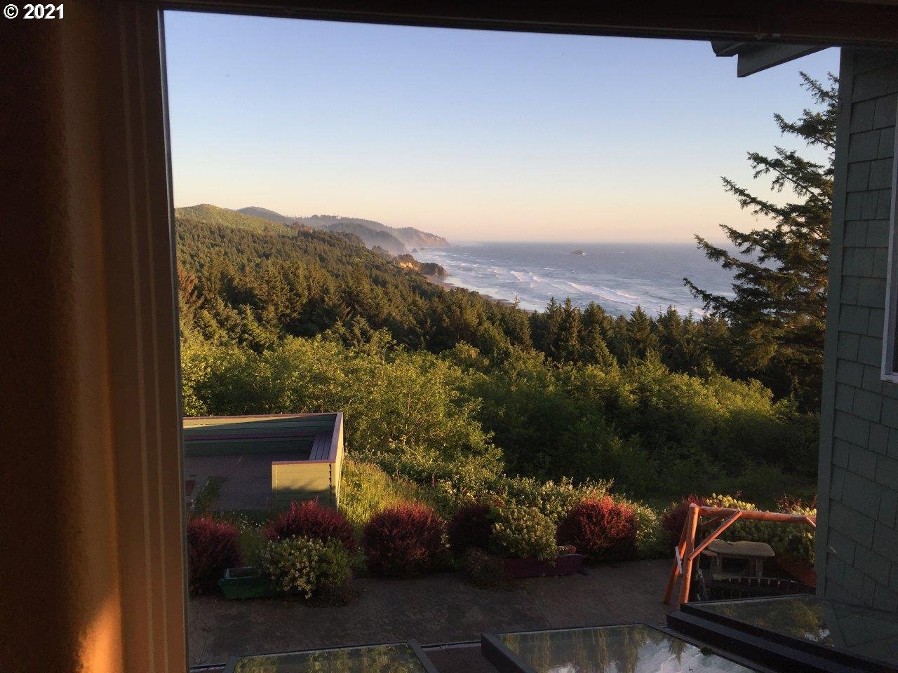 32307 Ruby Lane Cannon Beach, OR 97110 - Photo 22 of 27 a view of a balcony with a yard