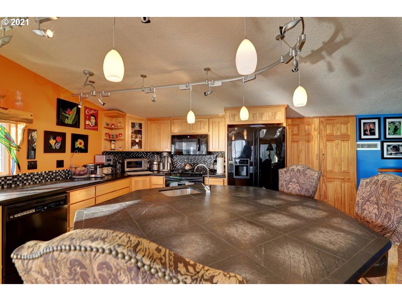32307 Ruby Lane Cannon Beach, OR 97110 - Photo 8 of 27 a view of a livingroom with furniture and a large window