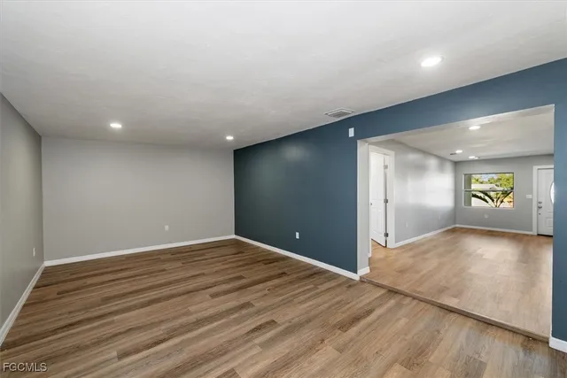 a kitchen with a refrigerator a sink and a stove