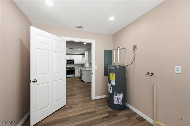 a view of an entryway with wooden floor