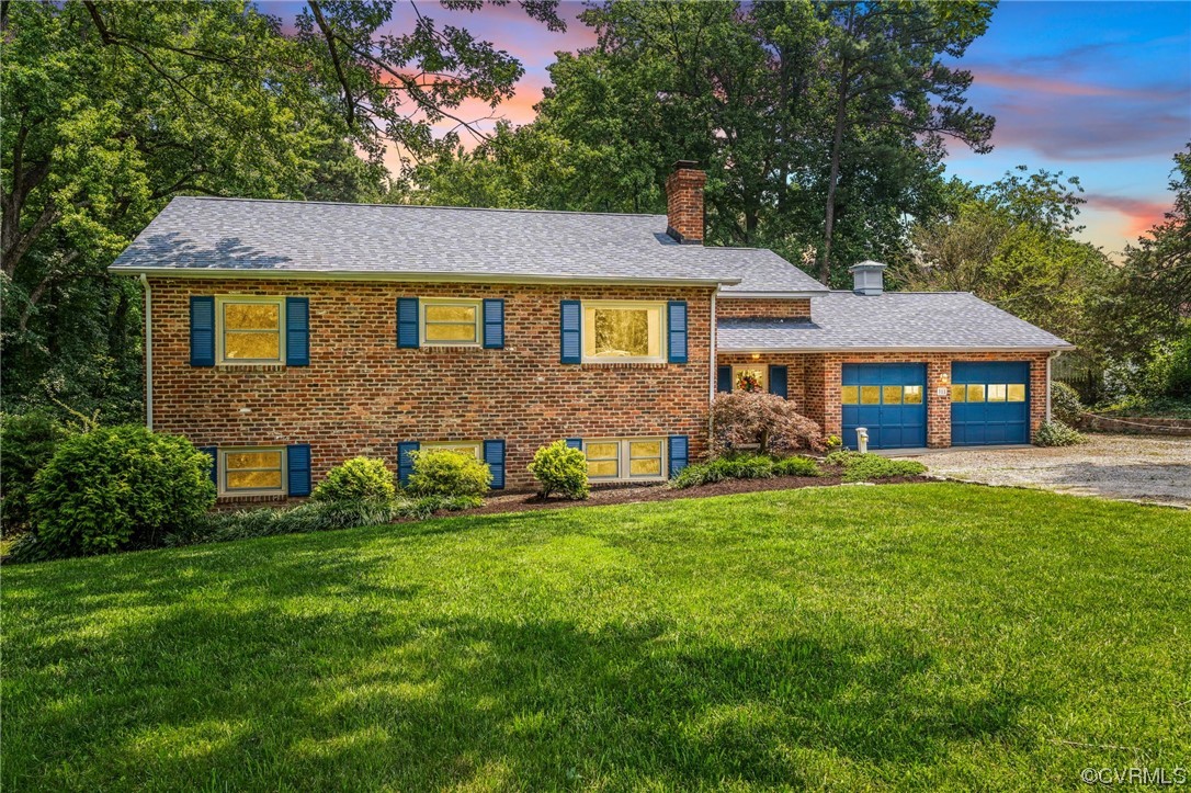 311 Monath Road North Chesterfield, VA 23236 - Photo 7 of 29 a front view of a house with a garden