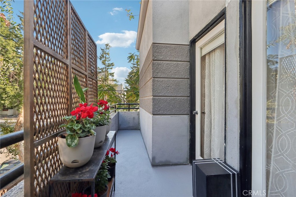 360 South Los Robles Avenue, Unit 11 Pasadena, CA 91101 - Photo 12 of 12 a view of a house with a potted plant