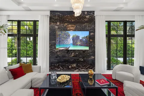 a large kitchen with a table and chairs