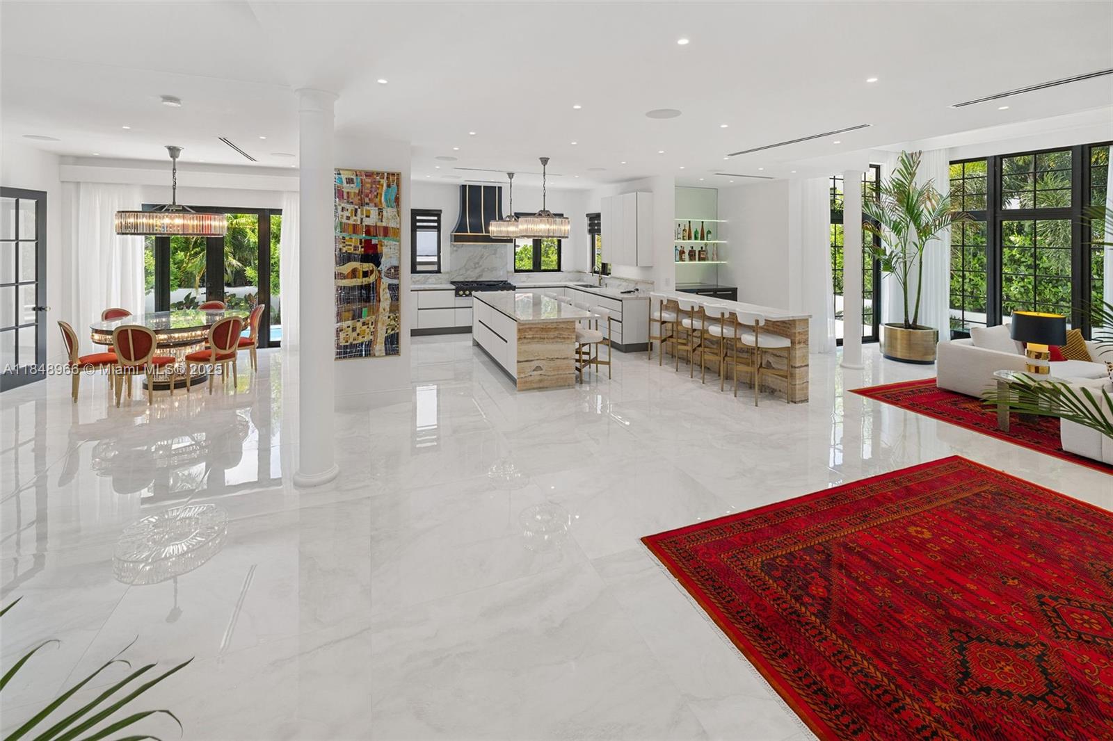 2321 North Bay Road Miami Beach, FL 33140 - Photo 19 of 77 a living room with furniture and a large window