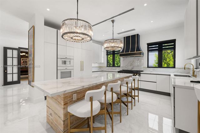 a view of a hallway view with staircase