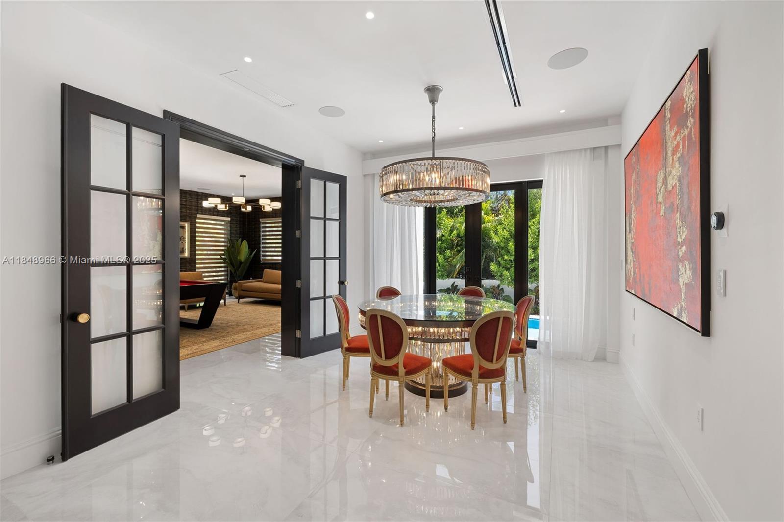 2321 North Bay Road Miami Beach, FL 33140 - Photo 28 of 77 a view of a dining room with furniture window and outside view