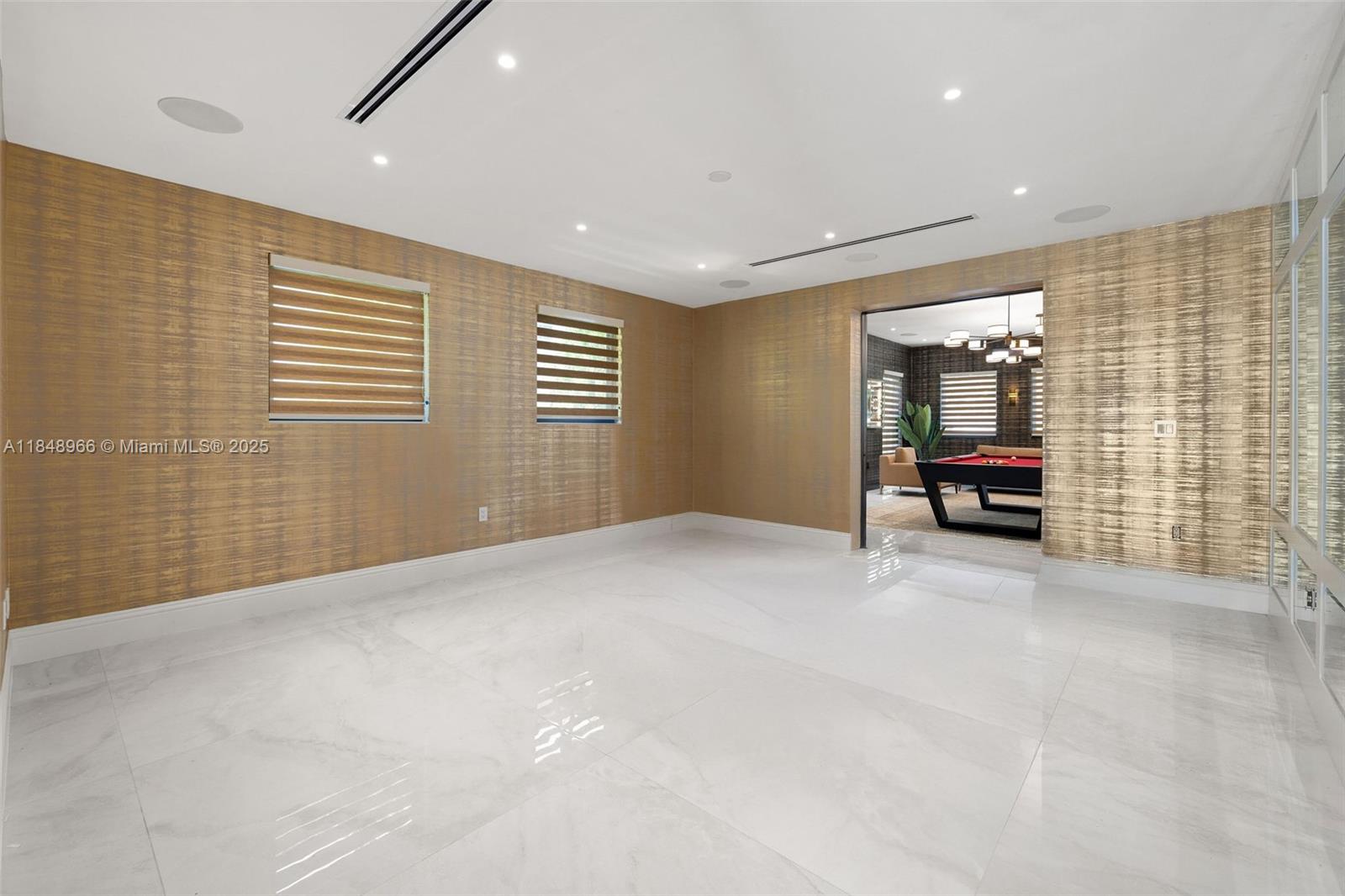 2321 North Bay Road Miami Beach, FL 33140 - Photo 35 of 77 a view of an empty room with a window